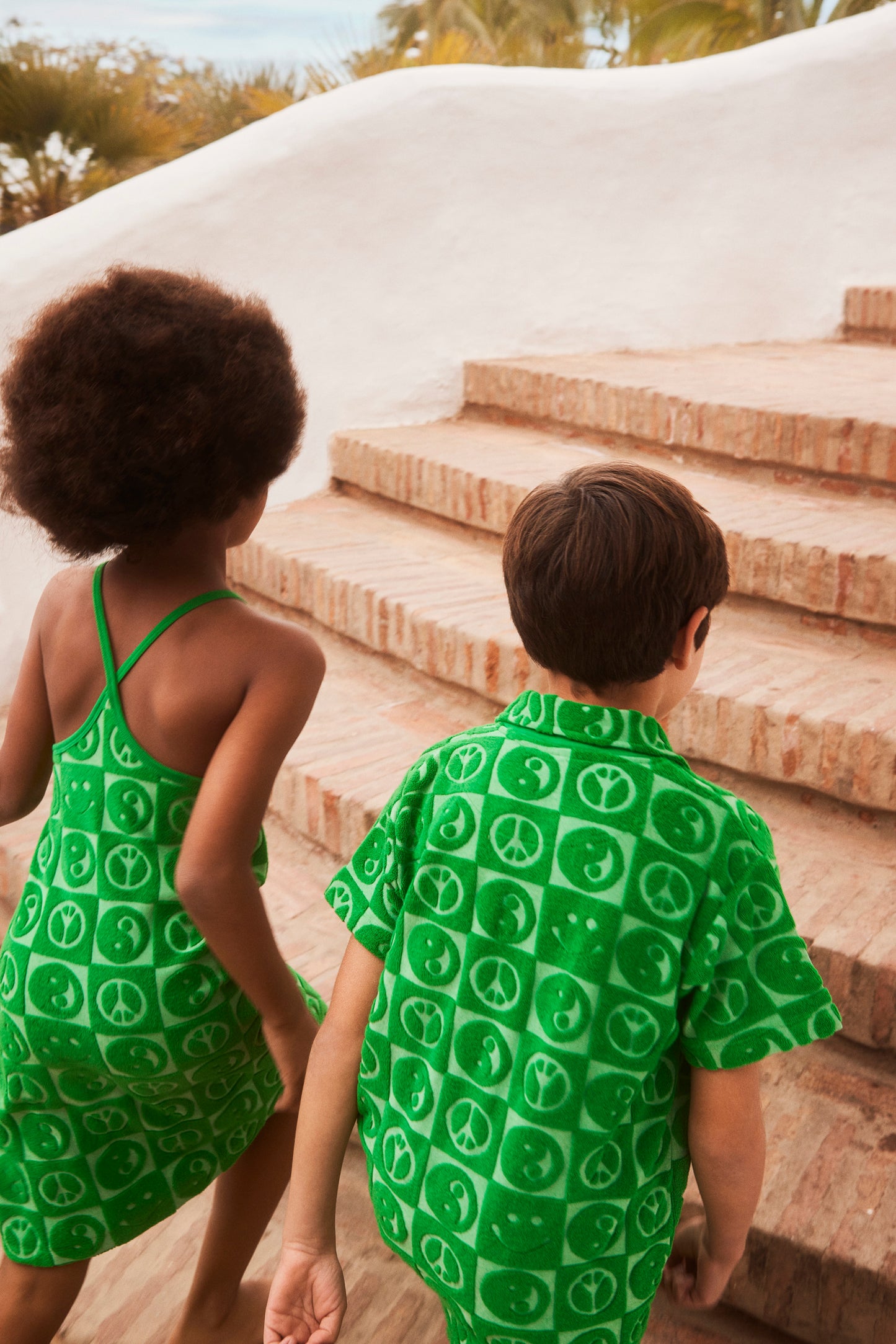 Vibrant Terry cloth dress peace symbols